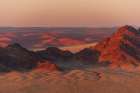 Light illuminates the Naukluft Mountains and Namib Desert at sunrise Namibia Art Print